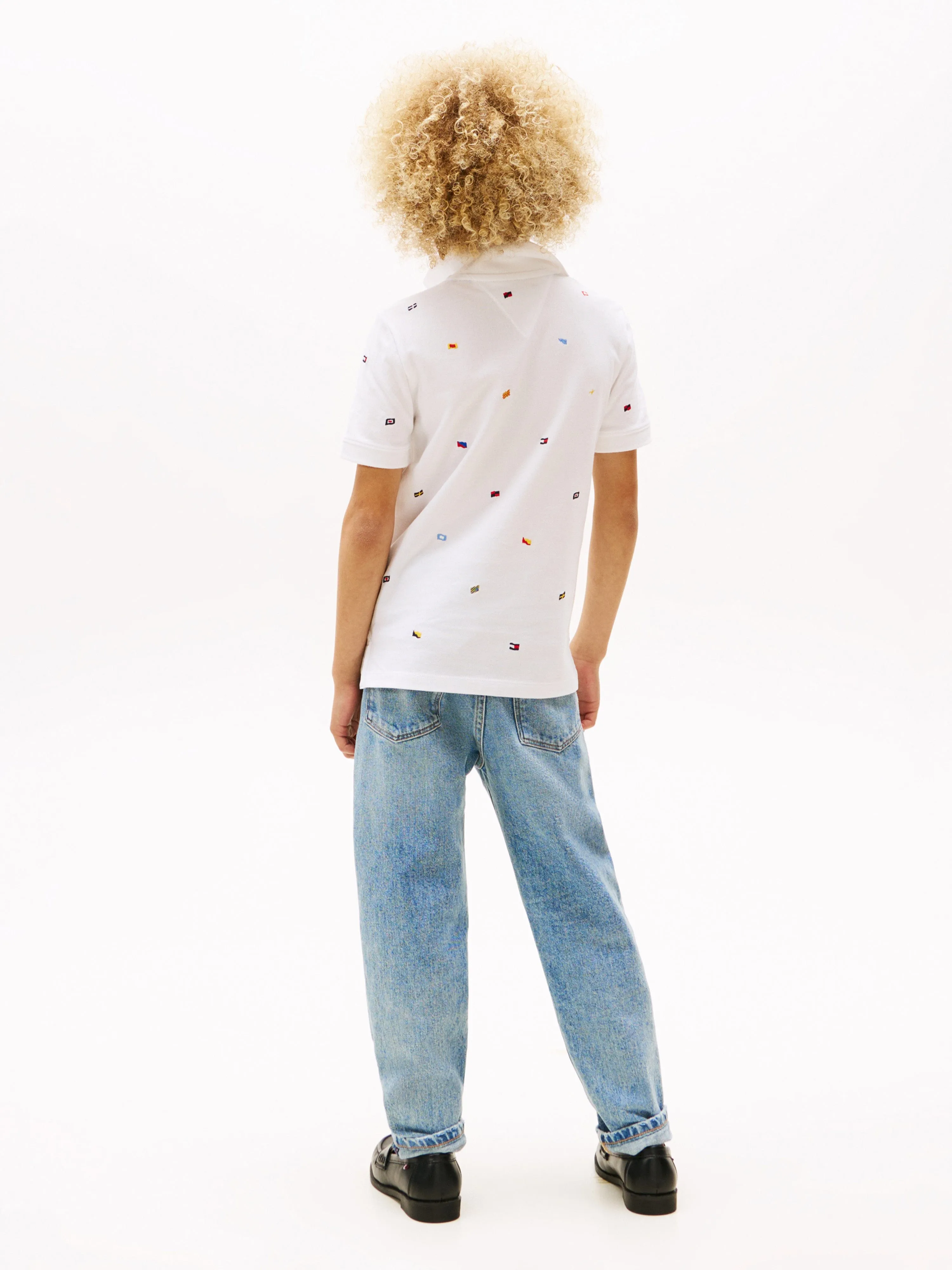 Tommy Hilfiger Boys All Over Flag Embroidered Polo Shirt in White